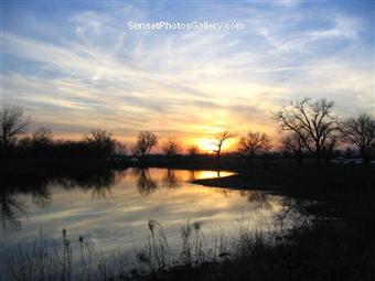 Nebraska Sunset over small lake next to Alda Sandhills Crane Viewing area on the Platte River