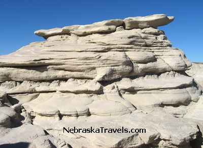 Multi layered Toadstool at top - Toadstool Park Hiking Trail - Nebraska Badlands area west of Nebraska Sandhills
